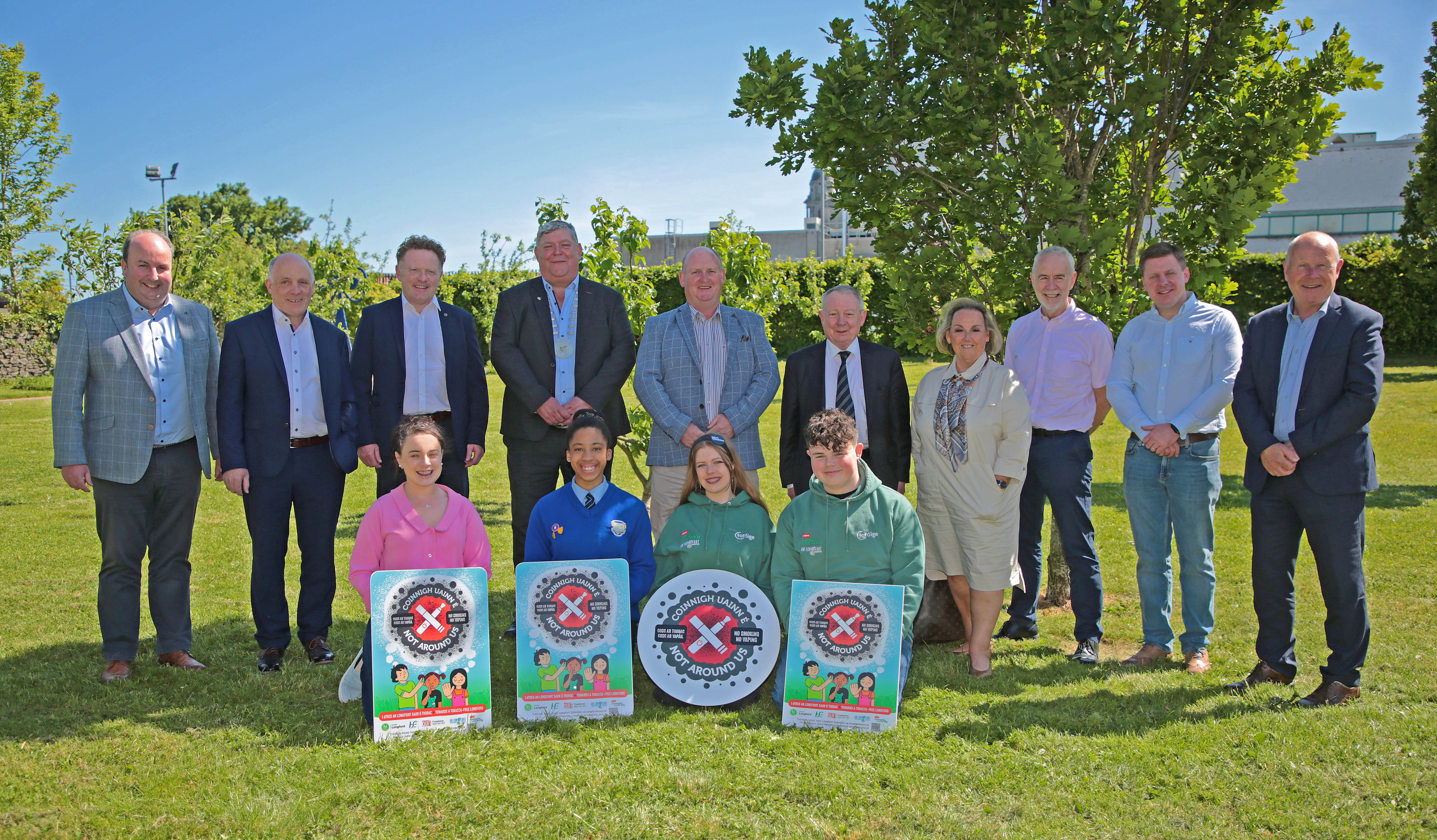 CB3B0121 Group of Longford County Council Councillors and young people with signage for the Not Around Us campaign