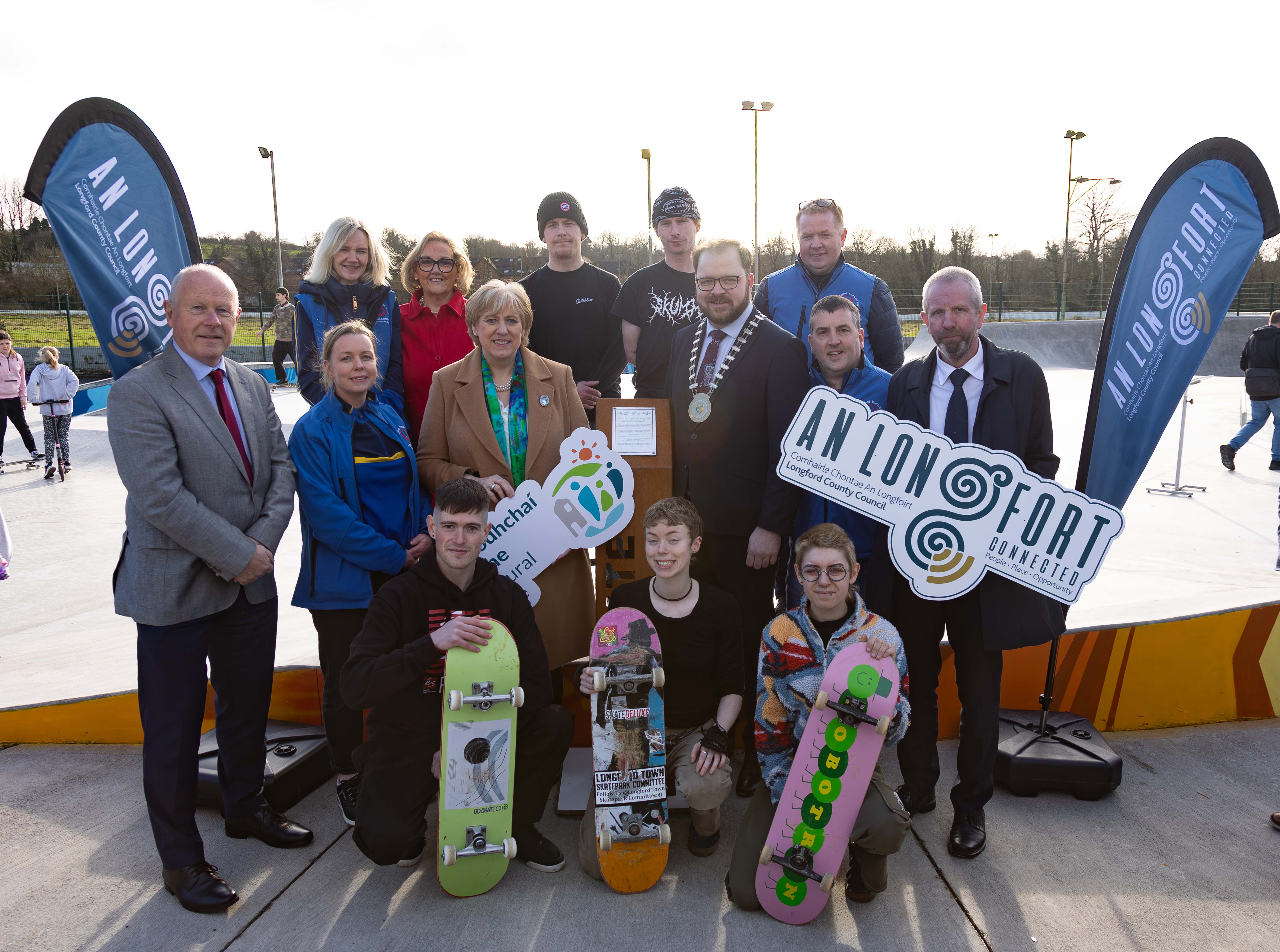 Group photo of 14 people at the launch of Longford Skate Park